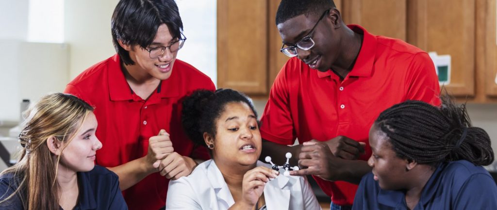 Group of teens problem solving